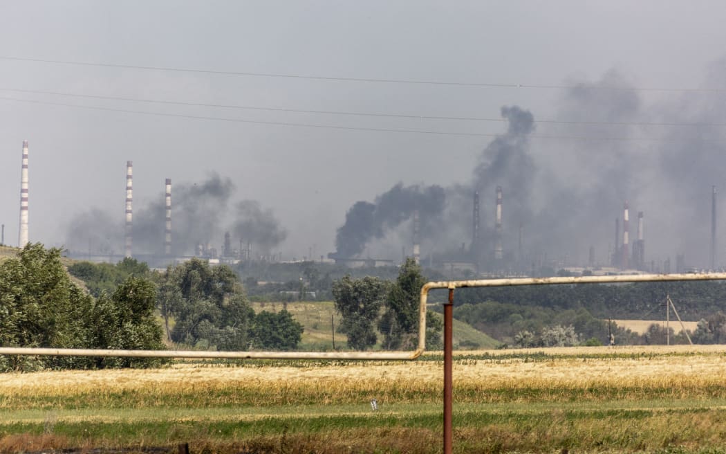 Plumes of smoke rise from Lysychansk during heavy fighting between Ukrainian forces with Russian troops on 1 July 2022.