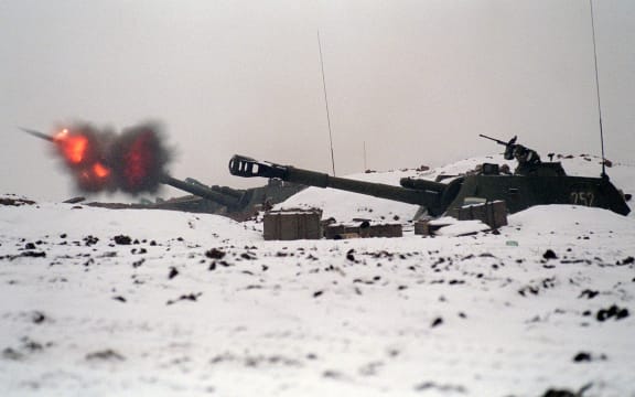 Russian artillery fires shells aimed at the south of Grozny on 24 January as Russian forces continued their military offensive against rebel positions arond the capital of the breakaway Chechen republic.