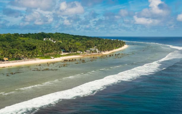 Nauru has signed a new deal with Australia to resettle hundreds of non-citizens caught up in the High Court's NZYQ decision. (AFP: Michael Runkel / Robert Harding)