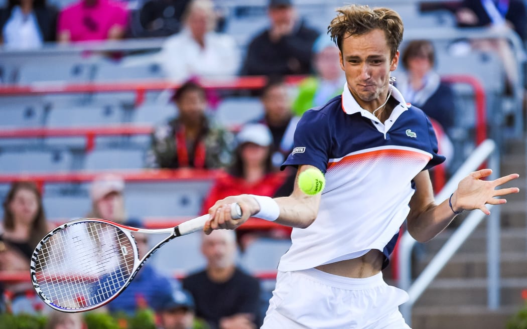 MONTREAL, QC - AUGUST 10: Daniil Medvedev (RUS) in motion to return the nall with a forehand shot during the ATP Coupe Rogers semifinal match on August 10, 2019 at IGA Stadium in MontrÃ©al, QC (Photo by David Kirouac/Icon Sportswire)
