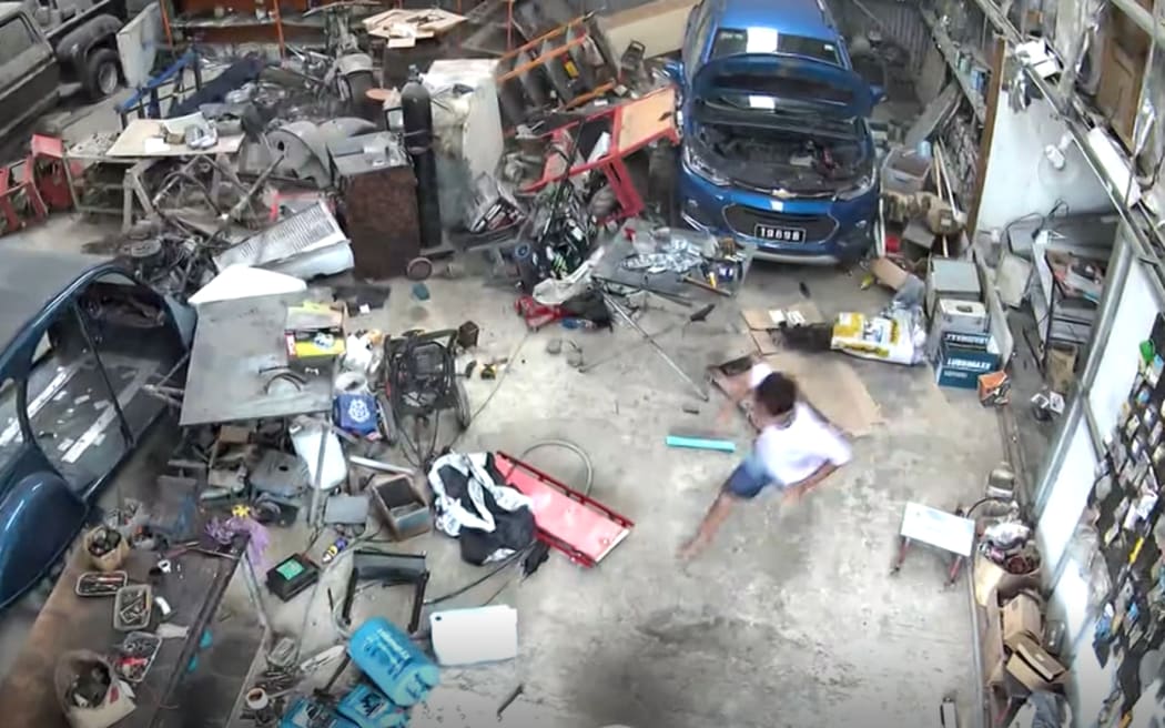 Screen grab from CCTV footage inside a garage of the moment a quake strikes in Port Vila, Vanuatu on 17 November , 2024