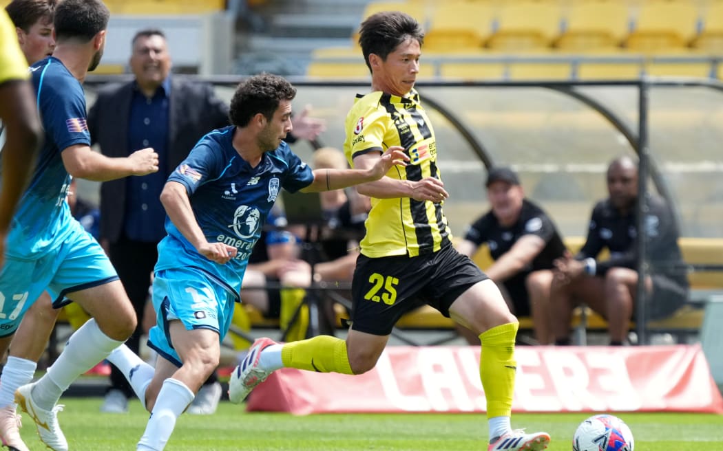 Phoenix Kazuki Nagasawa (R with Jets Alex Badolto during the A-League - Wellington Phoenix v Newcastle Jets football match at Sky Stadium, Wellington on the 14 December 2025. © Copyright image by Marty Melville / www.photosport.nz