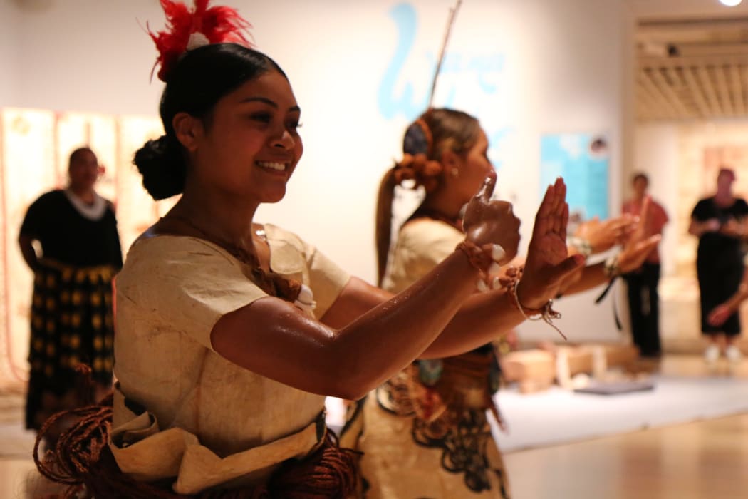 Daphnie Taulata (Left) performs a Tongan cultural dance at the Te Papa Museum in a costume made  of ngatu or bark cloth. Wellington February 2021