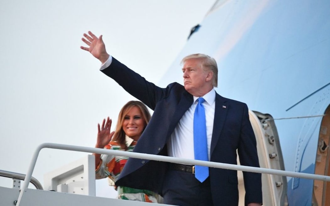US President Donald Trump and First Lady Melania Trump make their way to board Air Force One before departing from Andrews Air Force Base in Maryland on June 2, 2019.