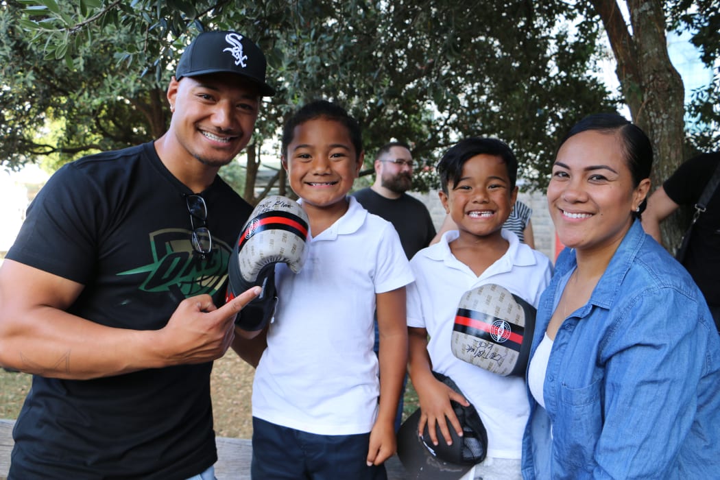 Mother of two, Senna Falemaka, picked her kids up from school early to beat the traffic and get to town on time.