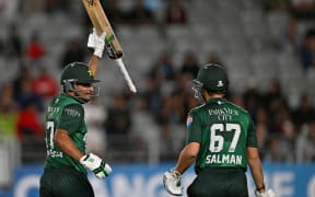 Pakistan's Hassan Nawaz (left) celebrates scoring 100 runs during the Blackcaps v Pakistan 3rd T20I at Eden Park, Auckland.