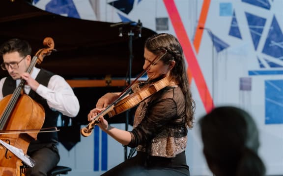 Musicians of the 2024 At The World's Edge Festival on stage.