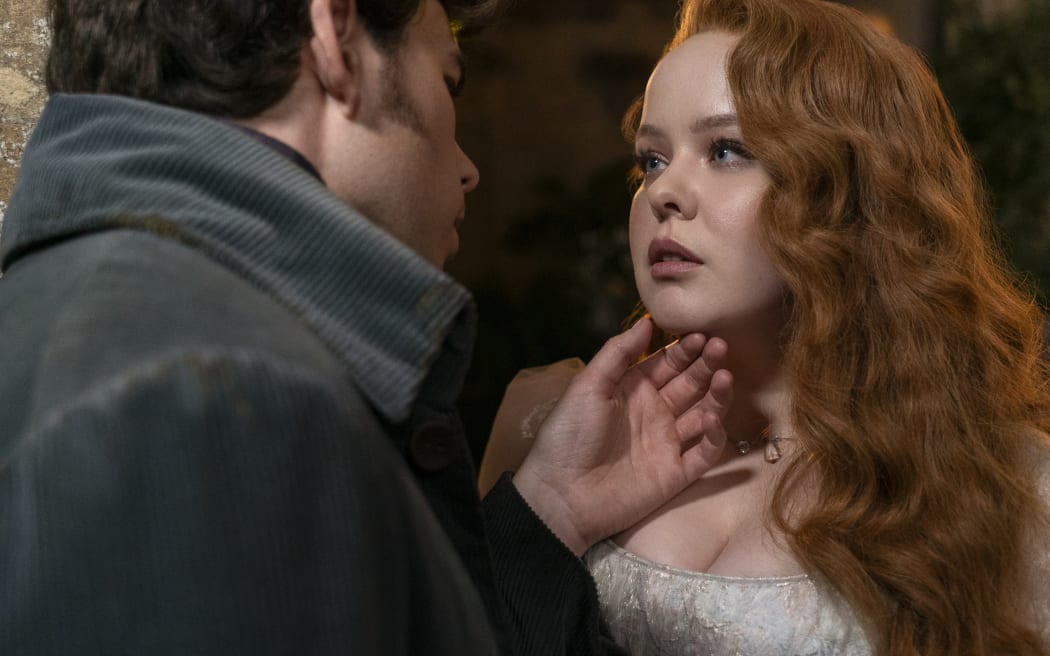 Bridgerton. (L to R) Luke Newton as Colin Bridgerton, Nicola Coughlan as Penelope Featherington in episode 302 of Bridgerton. Cr. Liam Daniel/Netflix © 2024