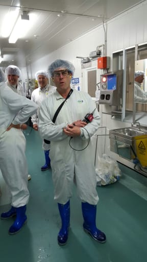 Hair nets, overalls and gumboots are compulsory attire at Fonterra's Collingwood St plant - even for visiting reporter Robin Martin.