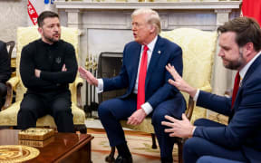Volodymyr Zelensky, Ukraine's president, from left, US President Donald Trump, and Vice President JD Vance speak to each other during a meeting in the Oval Office of the White House in Washington, DC, February 28.
