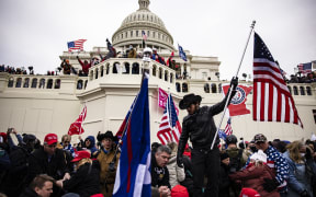 Pro-Trump supporters storm the US Capitol following a rally with President Donald Trump on 6 January, 2021 in Washington, DC.