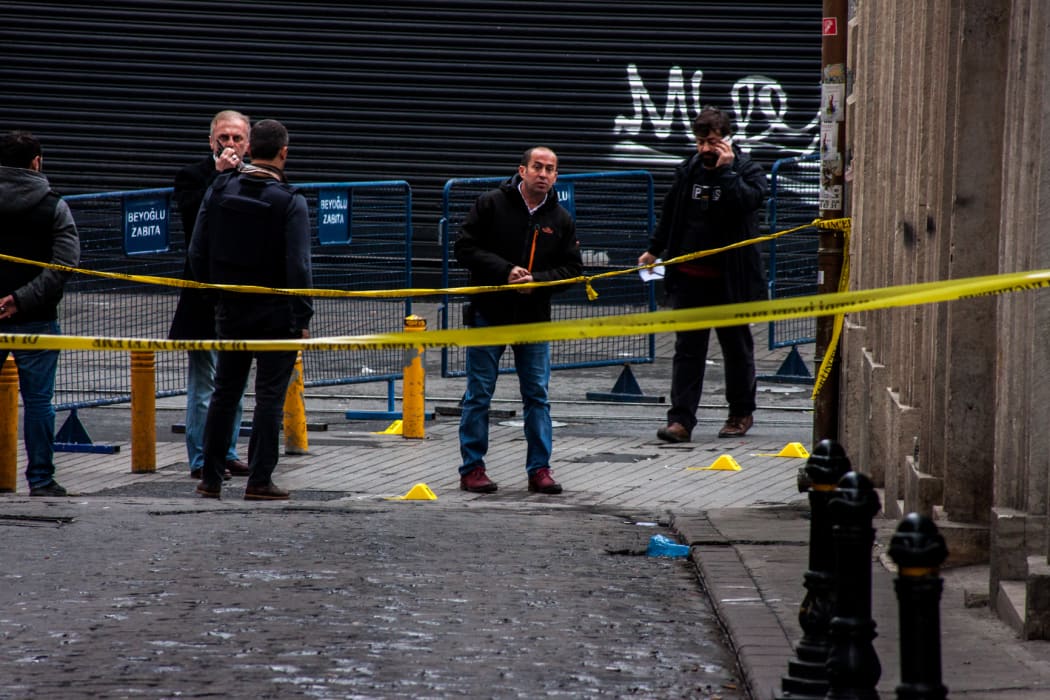 Police secure the area following a suicide bombing in a major shopping and tourist district at Istiklal street in the central part of the city on March 19, 2016 in Istanbul, Turkey.