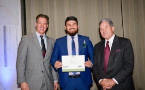 Fullbright scholarship winner Abbas Nazari with US Ambassador to NZ Scott Brown (left) and Deputy Prime Minister Winston Peters (right).