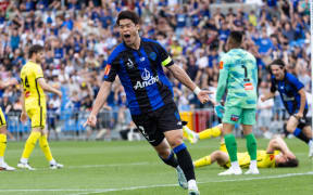 Auckland FC captain Horoki Sakai celebrates after Wellington Phoenix scored an own goal during during the A-League football match at Mt Smart Stadium, 7 Dec 2024.