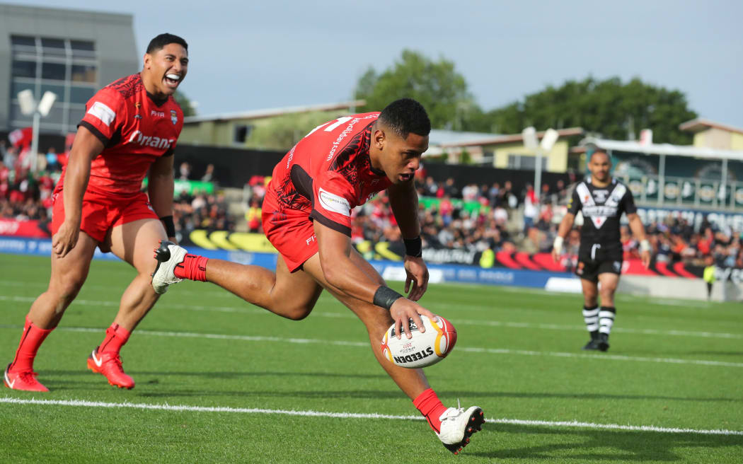 Tonga's David Fusitu'a scores one of his three tries against NZ at the 2017 World Cup