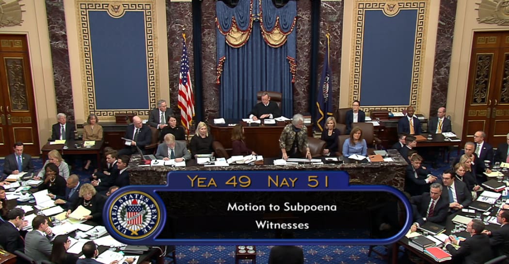 This still image taken from a US Senate webcast shows the tallying of the votes to block new witnesses during the impeachment trial in the Senate Chamber.