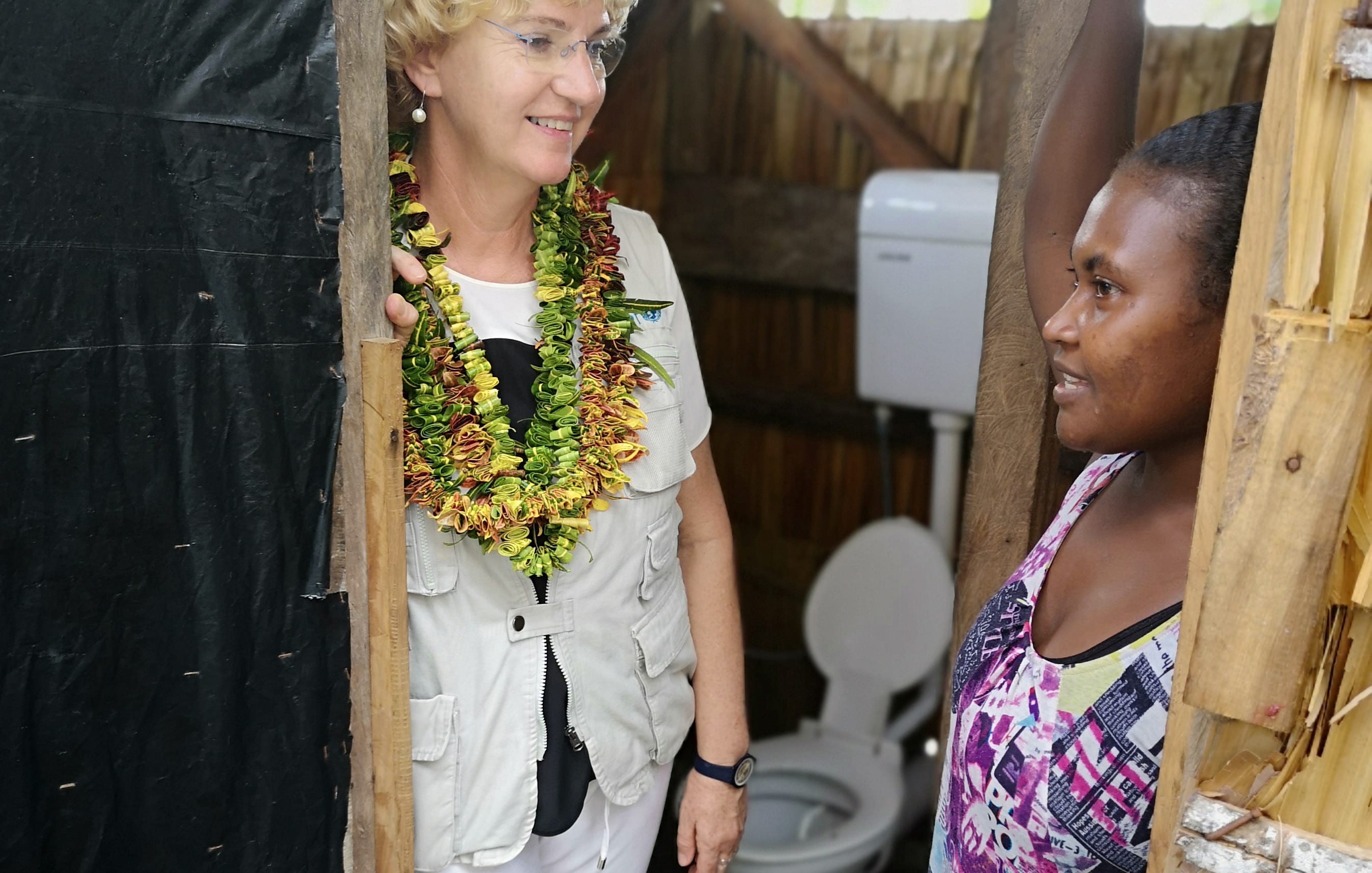 UNICEF Regional Director, Karin Hulshof in Walo community, North Malaita with a local woman.