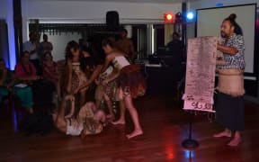 Daren Kamali performing his Masi poem with Vou Dance Fiji at EU Ambassador Andrew Jacobs' residence in Suva.