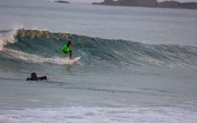 Eden Hasson, 10, surfing above a 3 metre Great White Shark in New South Wales