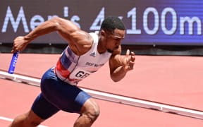 Britain's Chijindu Ujah competes in the men's 4x100m relay at the Tokyo Olympics.