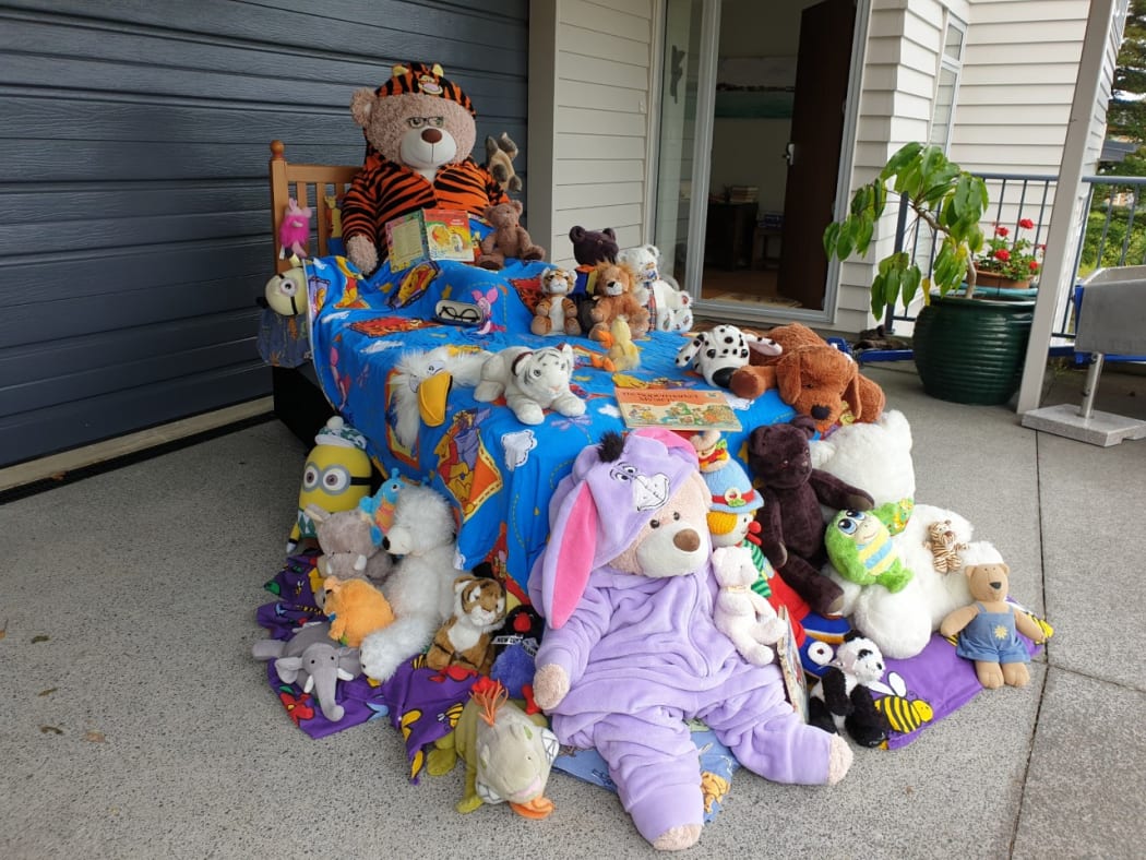Susan Mudford says the bears and their friends decided to have a stay in bed and read book day.