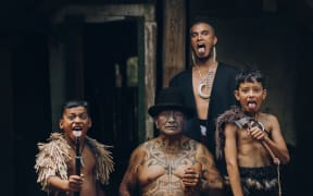 Stan Walker, Tame Iti and others in a scene from Walker's new music video 'Māori Ki Te Ao' (Māori to the world)