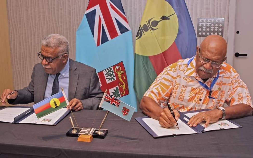 President of New Caledonia Mr Louis Mapou and Fijian Prime Minister Mr Sitiveni Rabuka signing MOU
