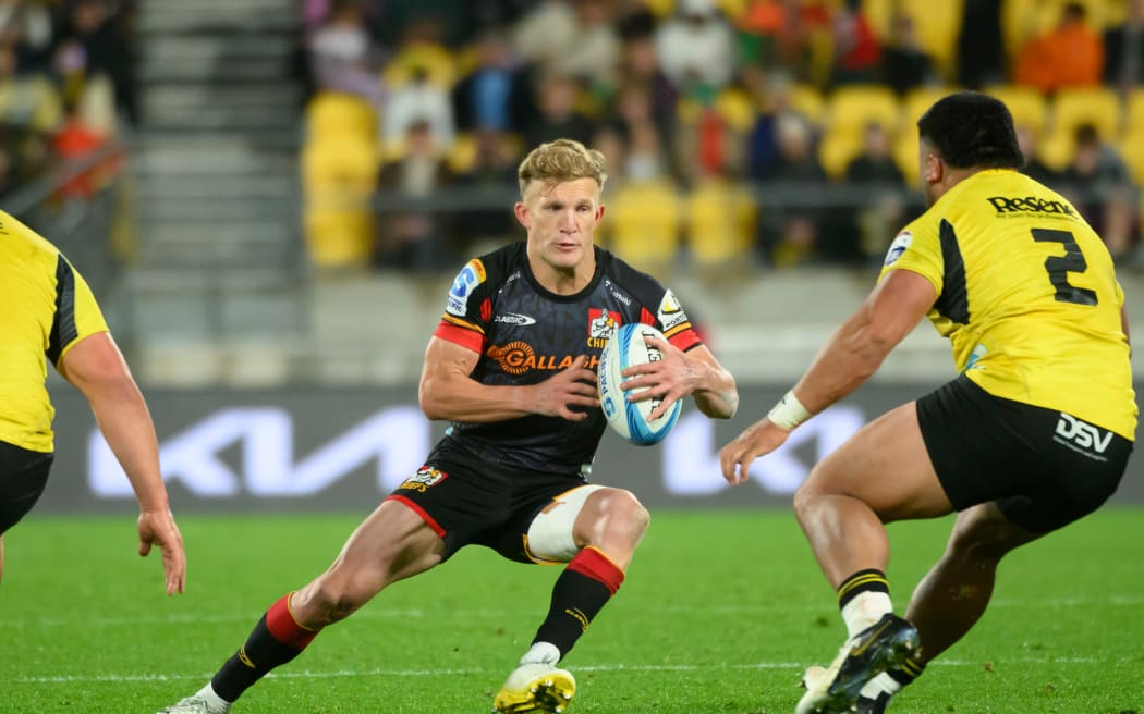 Damian McKenzie of the Chiefs makes run during Super Rugby Pacific - Hurricanes v Chiefs at Sky Stadium, Wellington, New Zealand on Saturday 13 April 2024. © Mandatory credit: Elias Rodriguez / www.photosport.nz