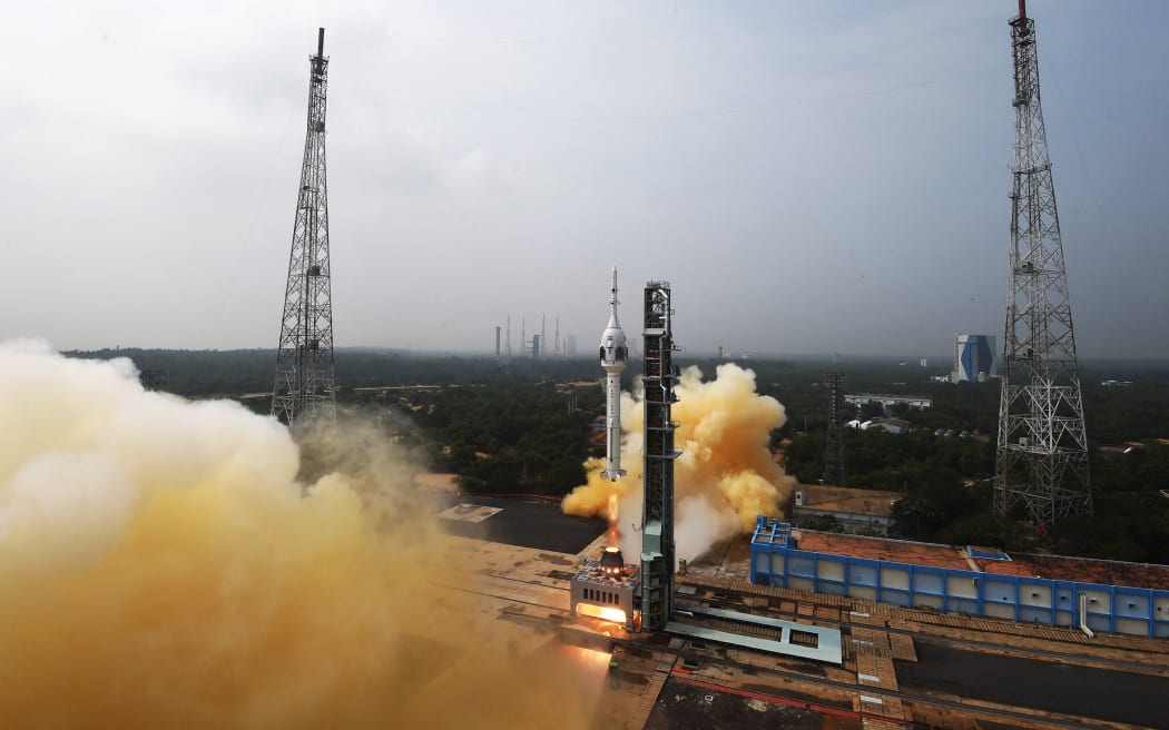 This handout photo taken and released by Indian Space Research Organisation (ISRO) on October 21, 2023, shows the lift-off of the Gaganyaan Test Vehicle (TV) from the Satish Dhawan Space Centre in Sriharikota, an island off the coast of southern Andhra Pradesh state. India on October 21 successfully launched the first unmanned trial run of its upcoming crewed orbital mission, in the latest milestone for its spacefaring ambitions. (Photo by ISRO / AFP) /