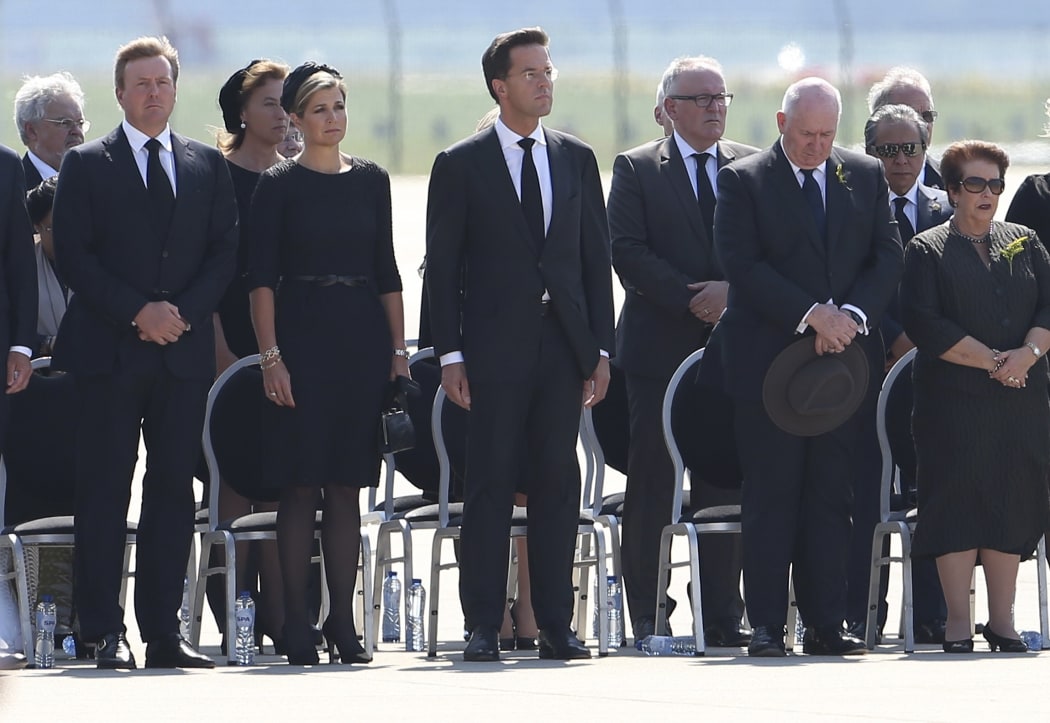 King Willem Alexander (left) and Queen Maxima of the Netherlands (second left), Dutch Prime Minister Mark Rutte (centre) and officials attended the ceremony.