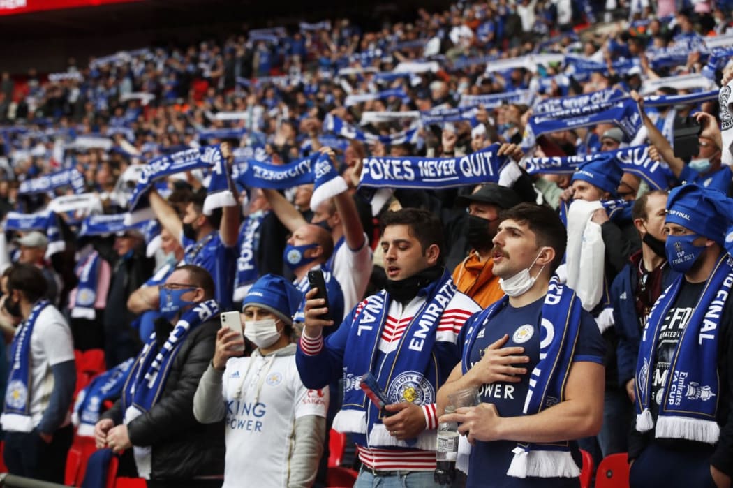 Leicester City fans cheer on their team ahead of the English FA Cup final football match between Chelsea and Leicester City at Wembley Stadium in north west London on May 15, 2021.