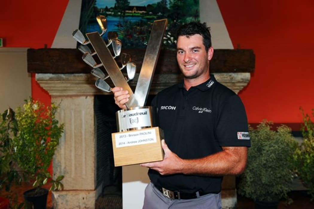 Ryan Fox holds the Le Vaudreuil Challenge trophy.