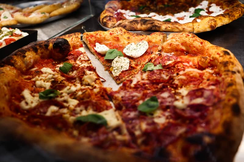 Pizza is seen at pizzeria in Milan, Italy on March 2, 2025.