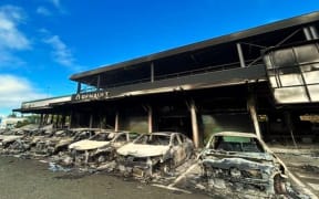 Burnt vehicles at the Renault dealership in Magenta district, Nouméa