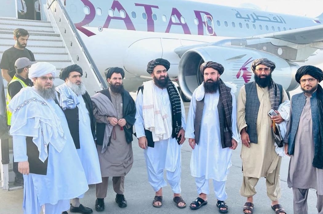 A high level Taliban delegation led by Foreign Minister Maulvi Amir Khan Mottaki (center) leave for Qatar. Senior Taliban officials and US representatives are to hold talks Saturday Oct 9 and Sunday Oct 10.