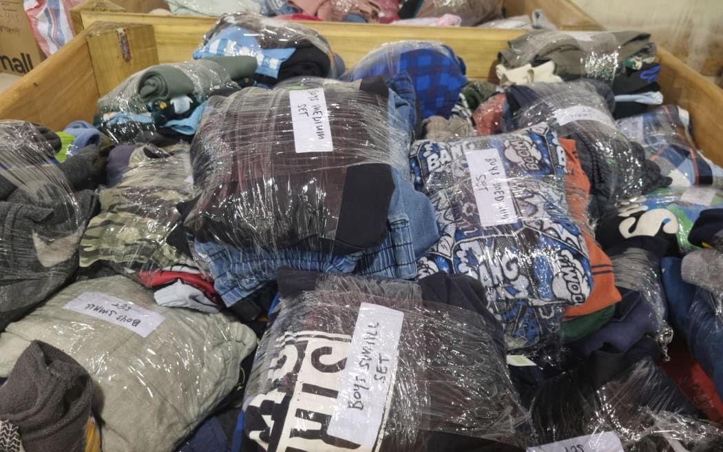 The Hastings' Tomoana Showgrounds has been transformed into a regional distribution hub for volunteers, Civil Defence staff, and military personnel to sort through donated clothing, food, and other supplies.