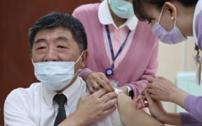 Taiwan's Health Minister Chen Shih-chung receiving a Covid-19 vaccine at the National Taiwan University Hospital in Taipei.