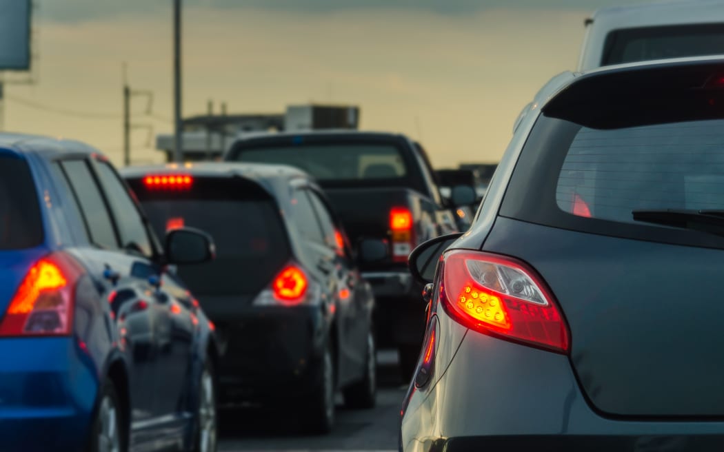 Taffic jam on highway during peak or rush hour.
