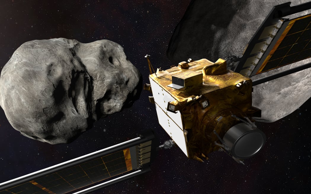 This artist's illustration shows the DART spacecraft from behind prior to impact at the Didymos binary system. NASA plans to crash a spacecraft into an asteroid next year in a test of "planetary defense."