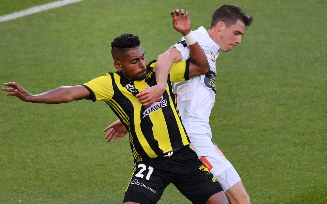 Roy Krishna and Mariners defender Jake McGing