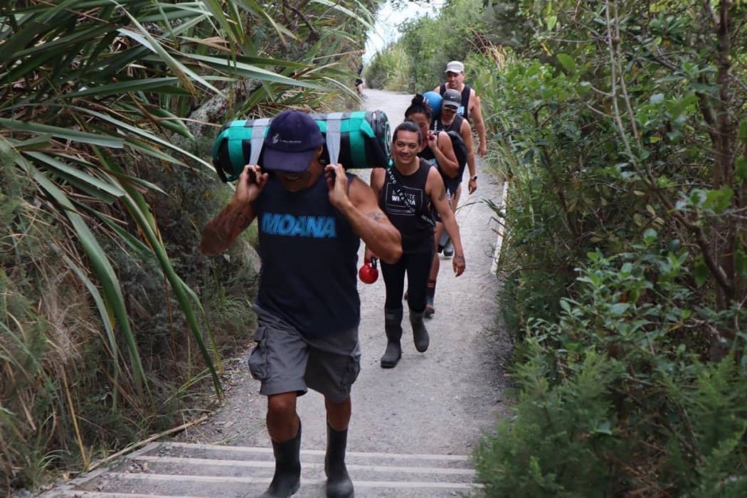 Moana Radio crew heading up Mauao as part of their weekly work out regime.