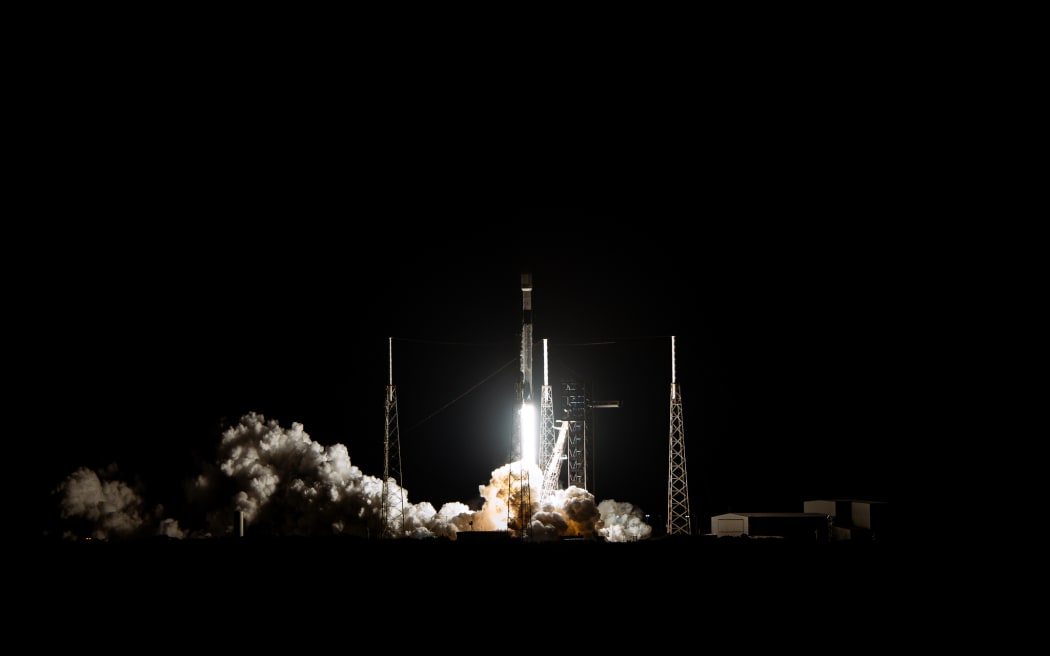 Space X Falcon delivering satellites into space.