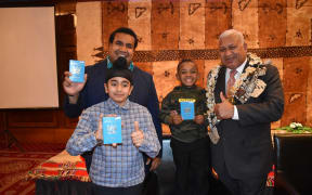 Prime Minister Frank Bainimarama with Fijians living in the UK.