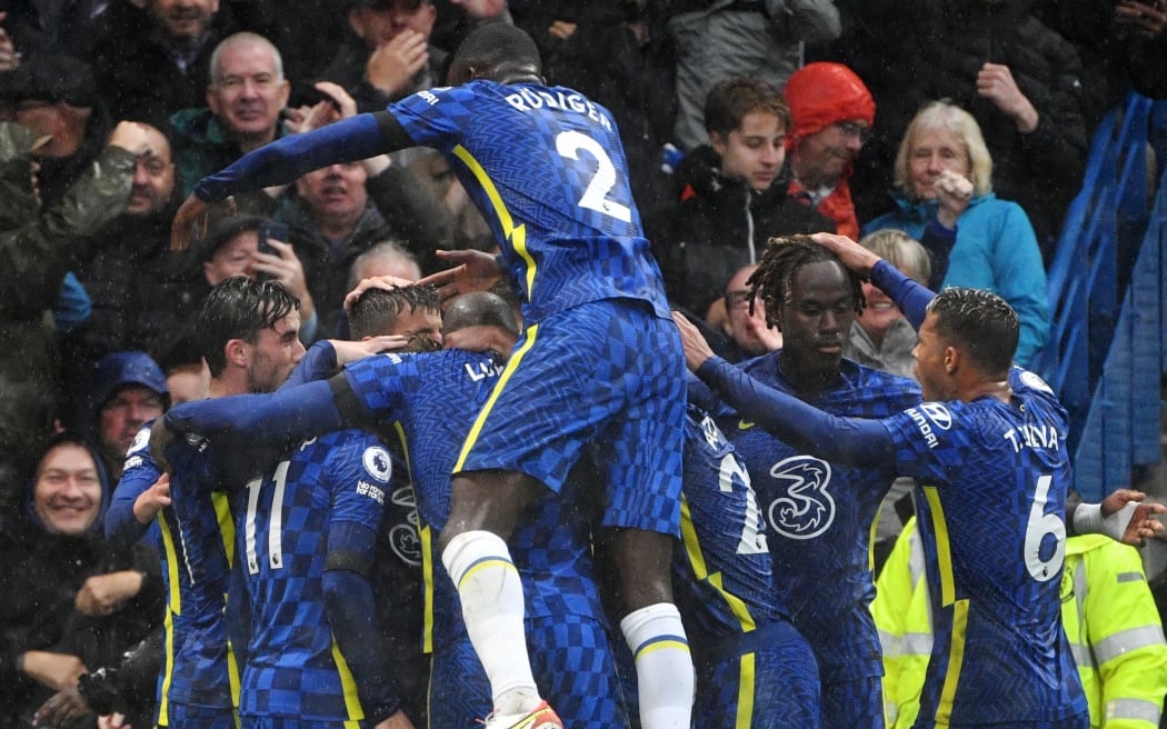 Chelsea's German striker Timo Werner celebrates with teammates after he scores his team's second goal during the English Premier League football match between Chelsea and Southampton at Stamford Bridge in London on October 2, 2021.