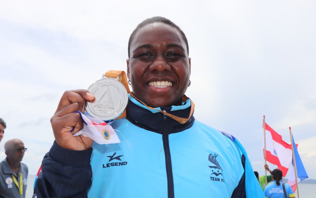 Elenoa Vateitei of Fiji with her spoils on day one of the competition.
