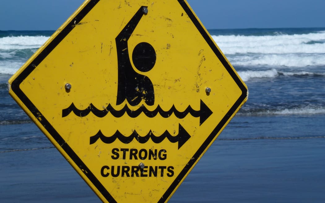 040314. Photo Todd Niall  / RNZ. Muriway beach, Auckland. Strong currents sign