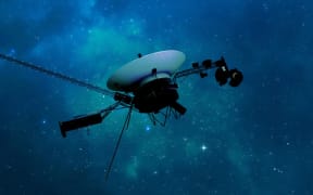 NASA's Voyager 1 spacecraft is depicted in this artist's concept traveling through interstellar space, or the space between stars, which it entered in 2012. NASA/JPL-Caltech