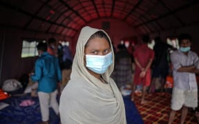 A Rohingya refugee is seen in a temporary shelter on Idaman Island, East Aceh Regency, Aceh Province, Indonesia.