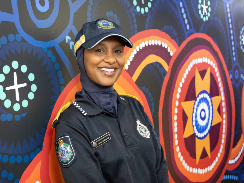 South Brisbane District police liaison officer Aulia Ibrahim wearing the NZ-designed police hijab as part of her uniform.