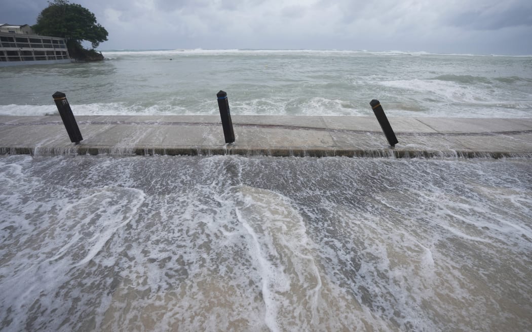 The sea floods the street after Hurricane Beryl passed through St. Lawrence, Barbados, July 1, 2024. (AP Photo/Ricardo Mazalan)
